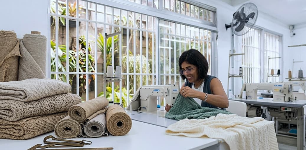 Atelier interior — natural light, fabrics, work table