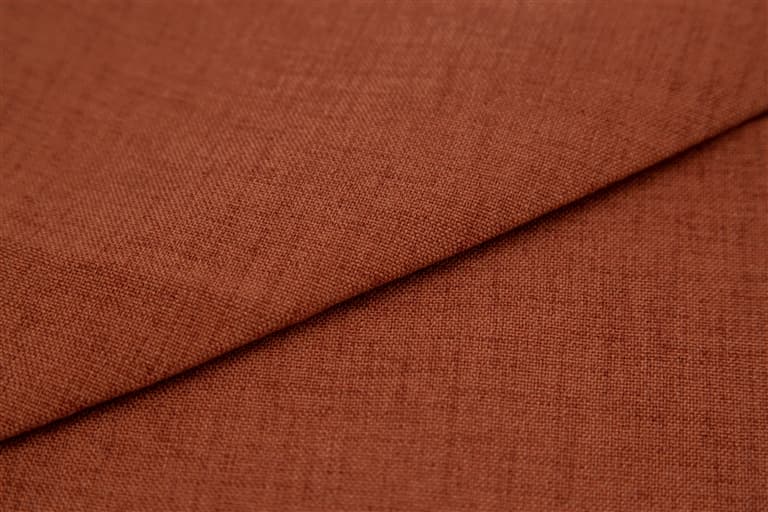 Folded terracotta fabric — smooth texture